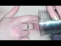 Teen squirting on a glass